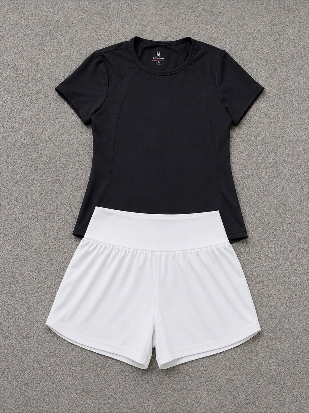 Spyder White Women’s Athletic Shorts and Black shirt